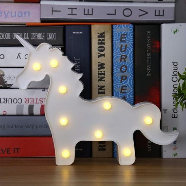 Unicorn Lamp, Wooden Shelves, Green Plants