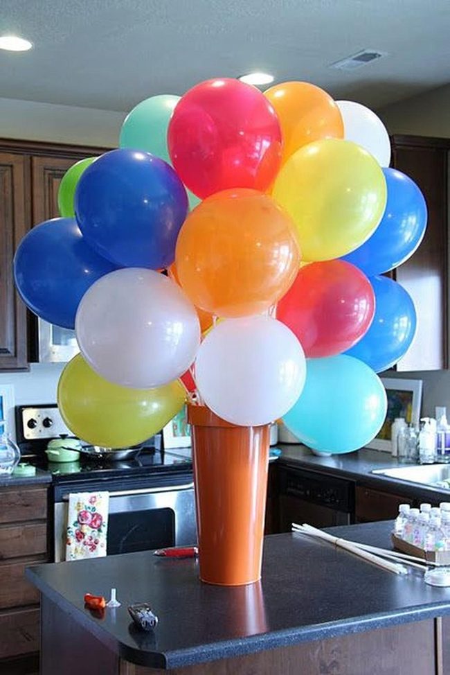Colorful Balloons In Orange Vase