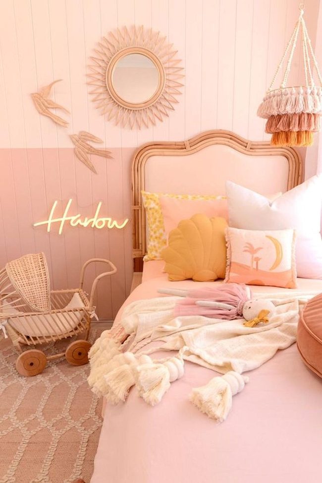 Pink Rattan Bedroom With Sunburst Mirror