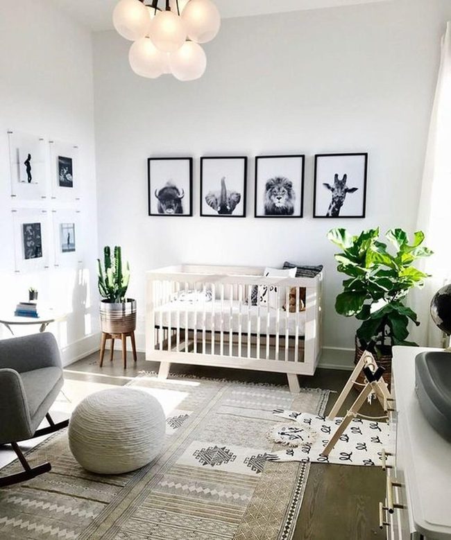 White Crib With Animal Wall Art