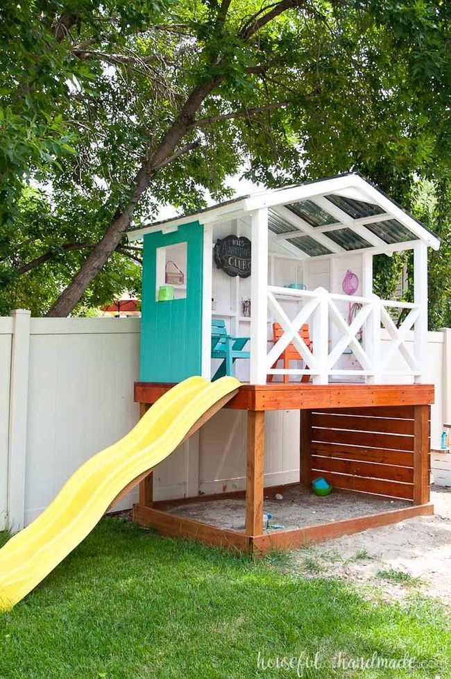 Elevated Playhouse With Bright Slides