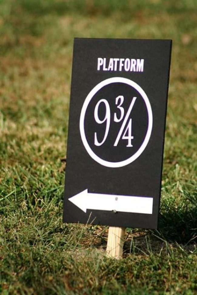 White Arrow Platform Sign