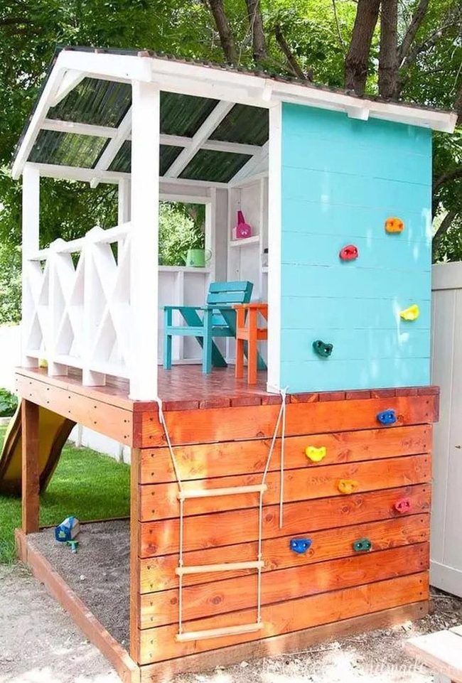 Blue Wood Treehouse With Climbing Wall