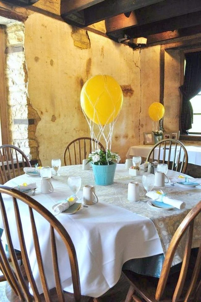 Yellow Balloons In Stone Dining Room