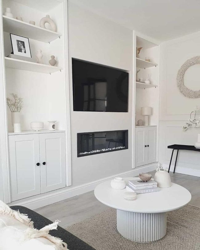 Cream Walls, Black Fireplace Integration