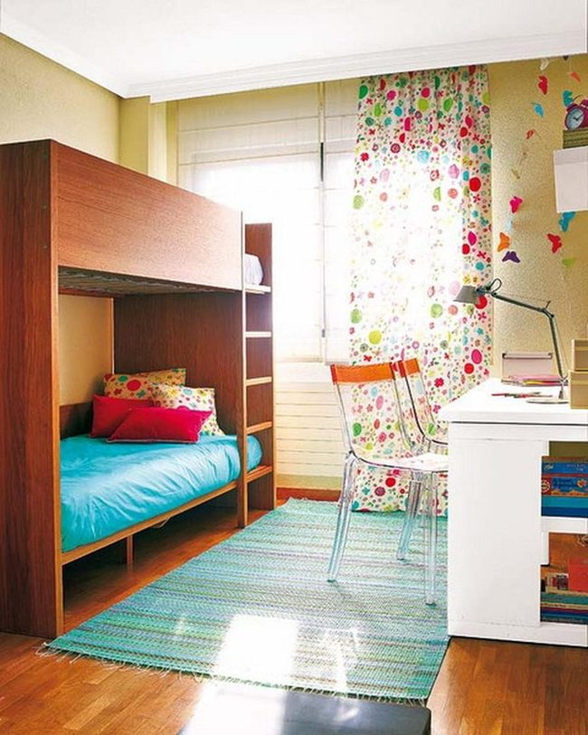 Red Pillows, Wooden Bunks, Bright Windows