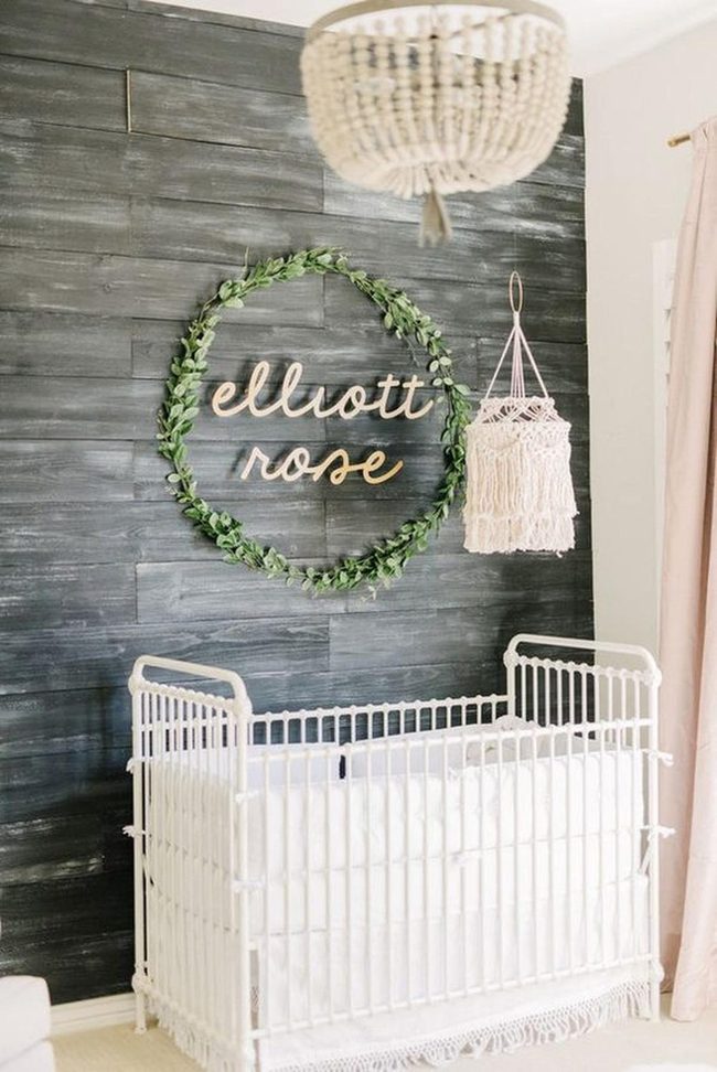 Dark Wood Nursery With Pink Accents