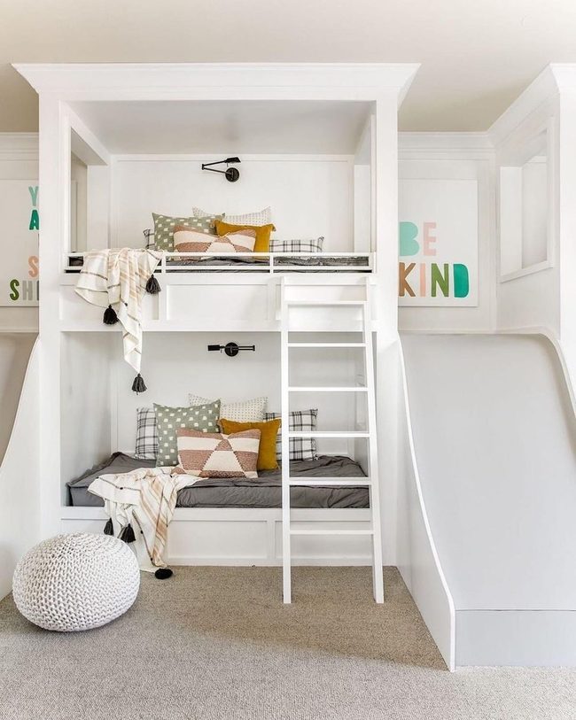Lofted Bed with Patterned Pillows