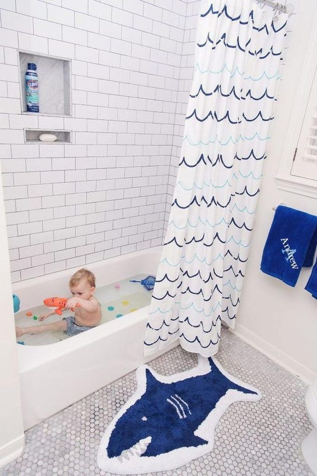 Navy Shark Rug Splashing Bathroom