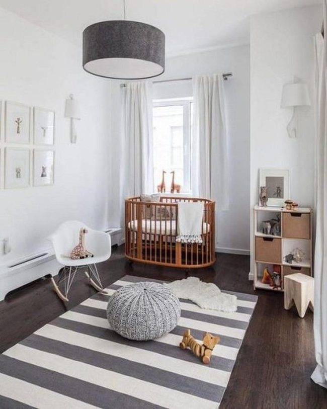 Round Wooden Crib By Window
