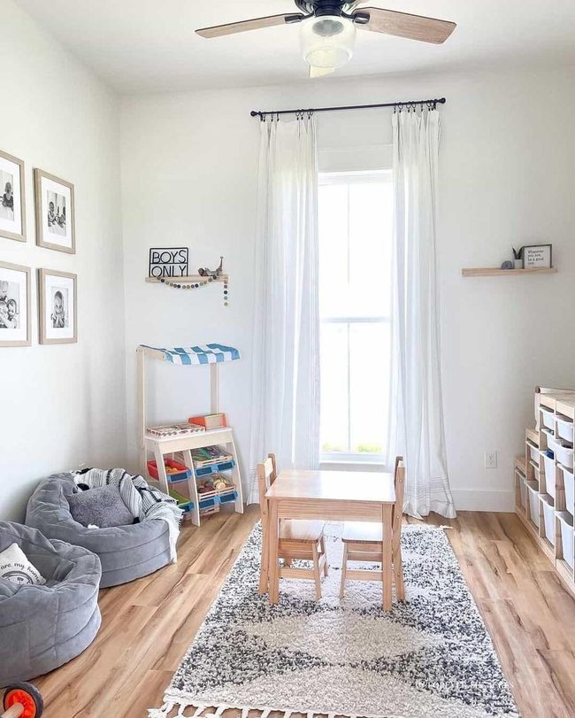 Sunlit White Playroom With Wood Floors