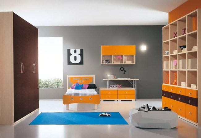 Orange Bed, Gray Walls, Blue Rug