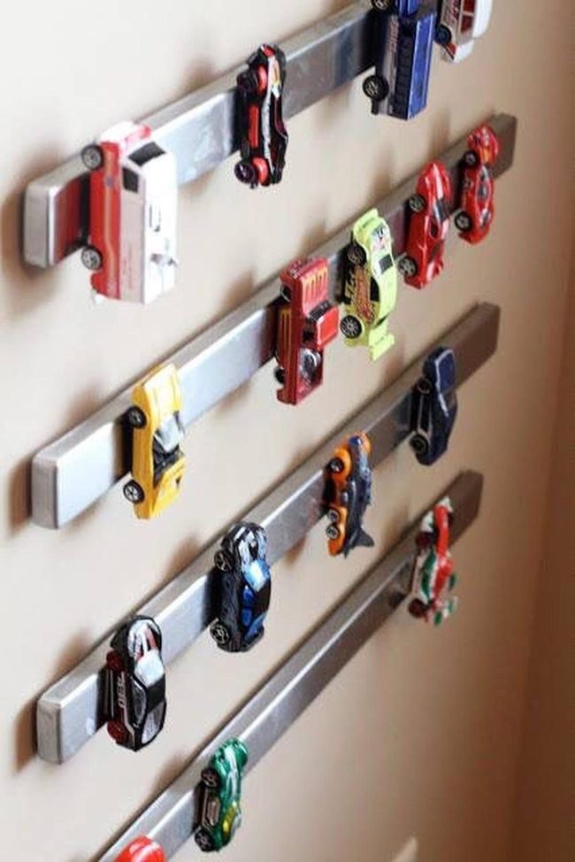 Miniature Cars On Metal Rails