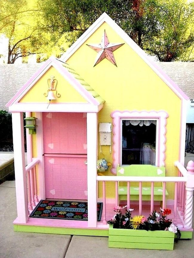 Yellow Playhouse With Pink Trim