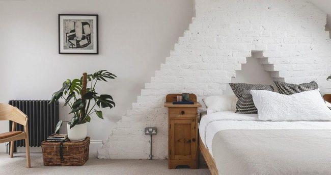 Whitewashed Brick Attic Bedroom