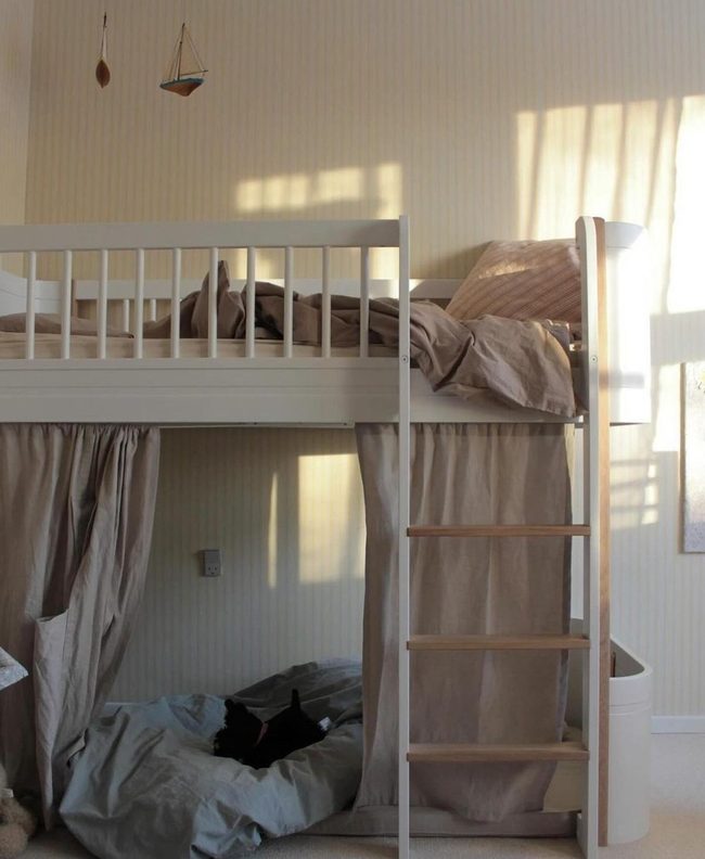 Beige Loft With Draped Curtains