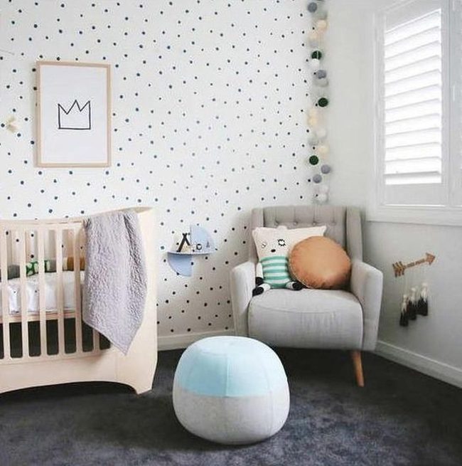 Gray Chair Nursery With Wooden Crib