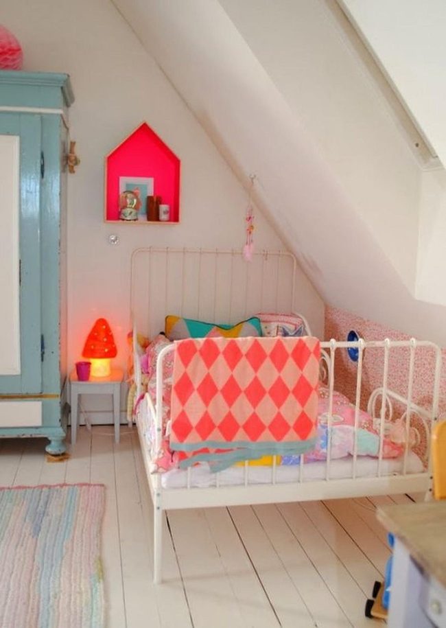 White Metal Bed, Rainbow Pillows