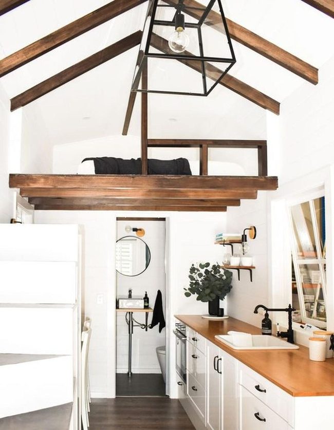Black Pendant Over Modern Farmhouse