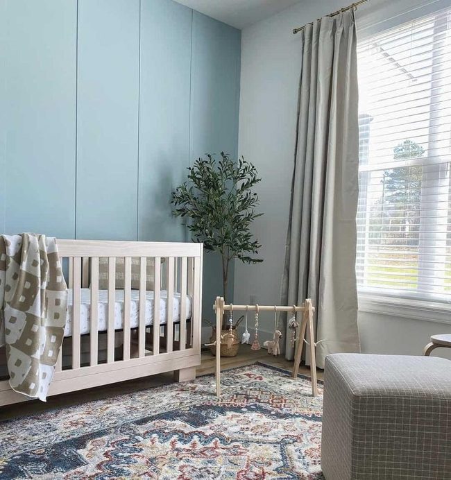 Light Blue Nursery with Wooden Warmth