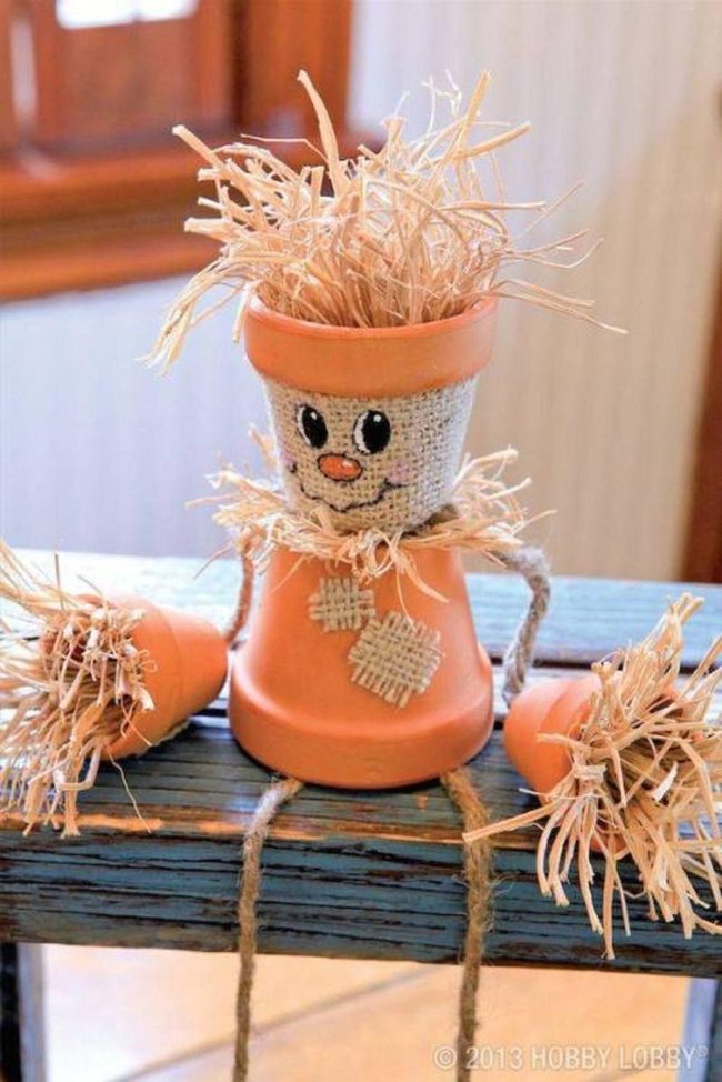 Stacked Terracotta Scarecrow Figures