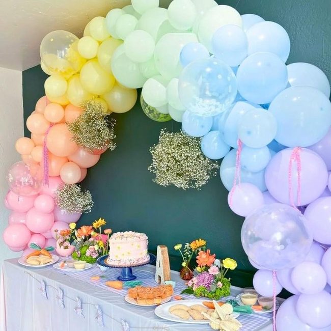 Rainbow Arch With Floating White Clouds