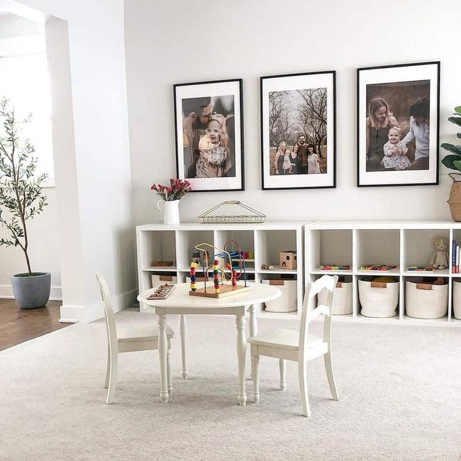 Family Portraits Above Toy Storage