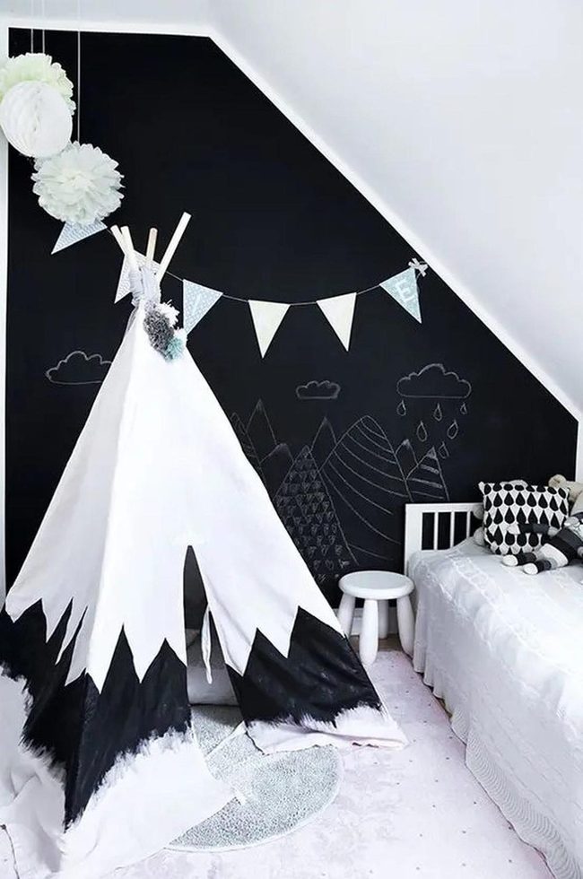 Black Teepee, White Walls, Colorful Flags