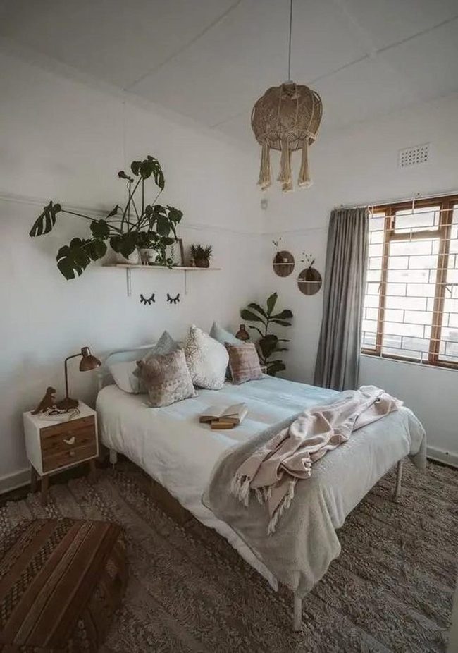 Green Plants Fill Sunlit Bedroom