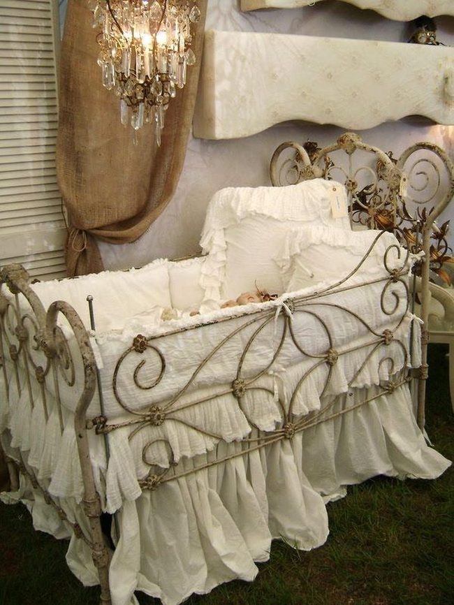 Ornate Iron Crib With Crystal Light