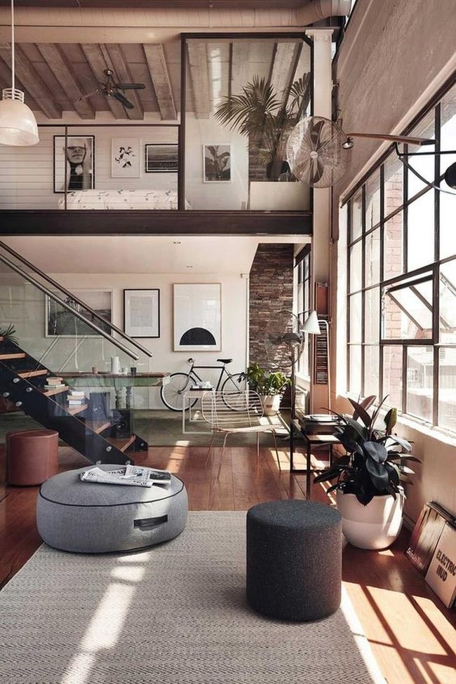 Glass Staircase Connects Modern Gray Space