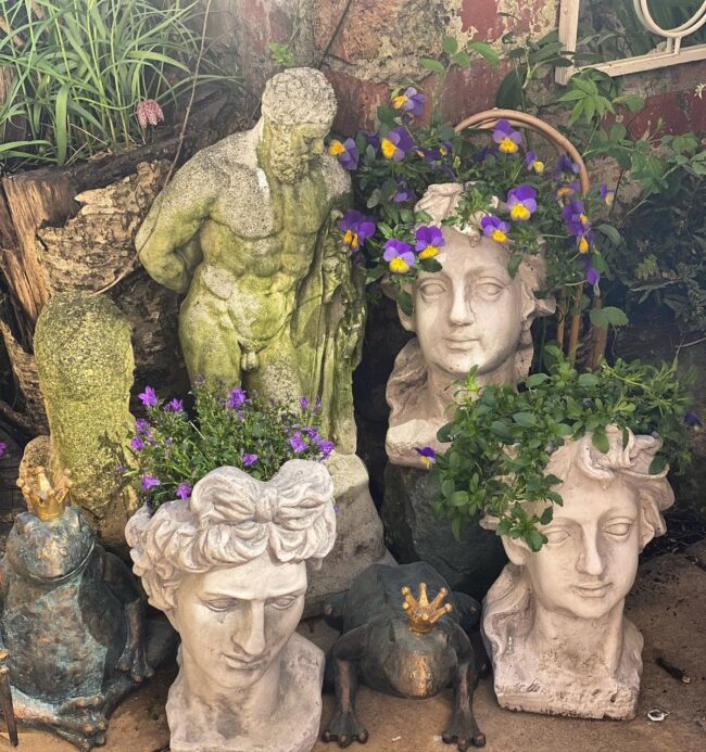 Expressive Planter Heads and Artistic Statues