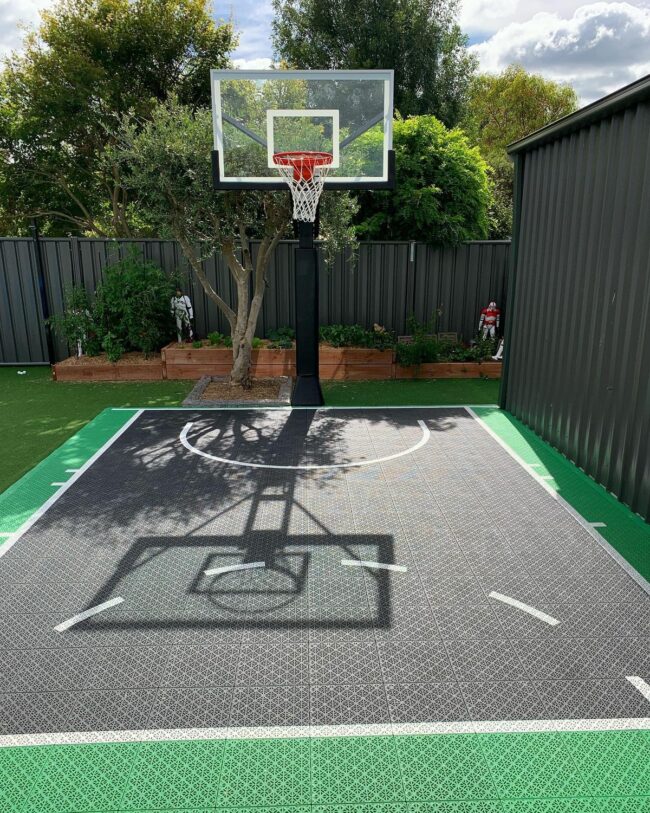 Eco-Friendly Green and Black Court with Lush Vegetation