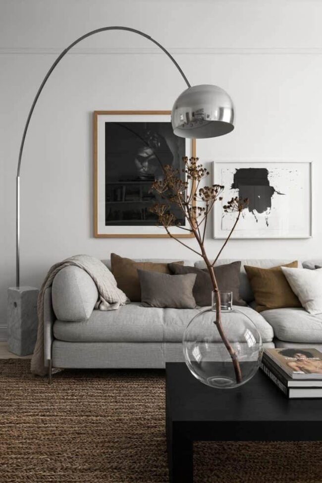 Arched Design: Grey Sofa Meets Modern Lighting