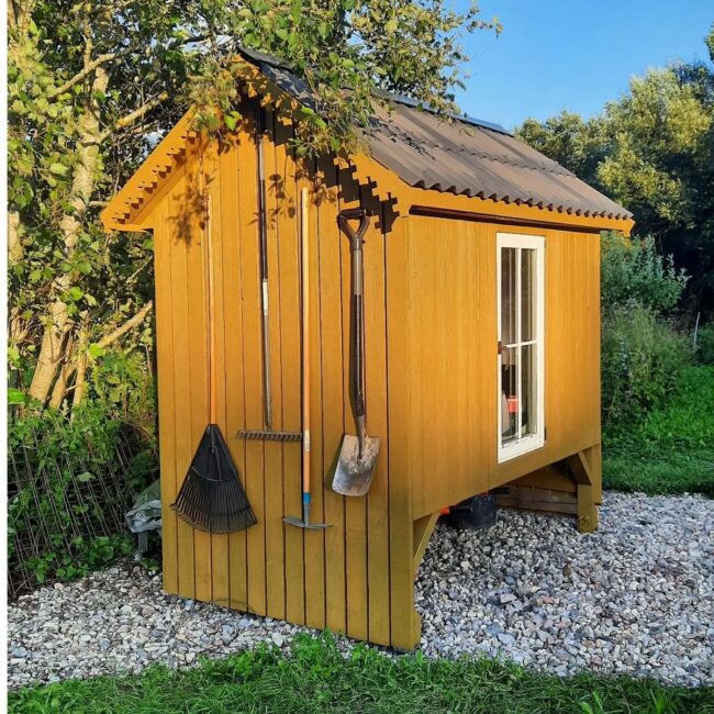Sunny Yellow Shed for Organized Tools