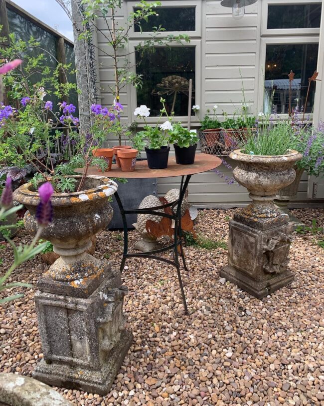 Antique Urns Showcase Stunning Garden Design