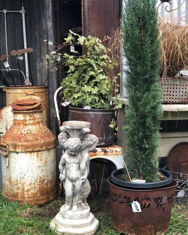 Timeless Statues and Rustic Garden Accents