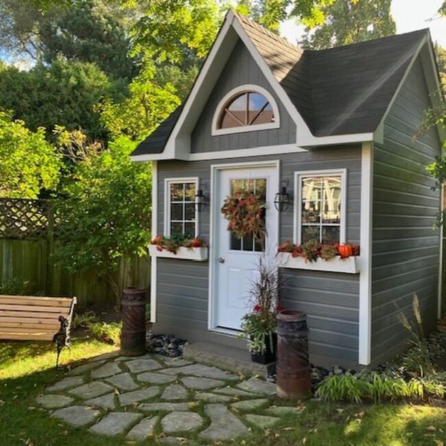 Charming Cottage Shed with Seasonal Touches