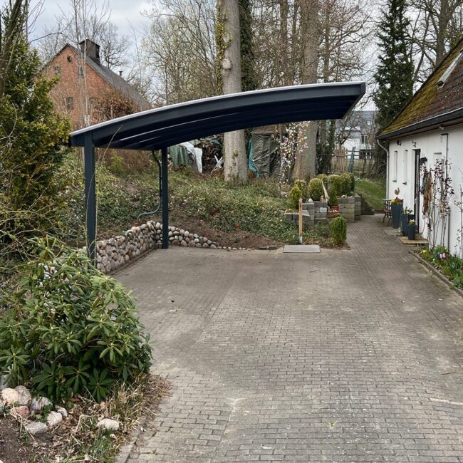 Sleek Metal Carport With Transparent Roof Panels