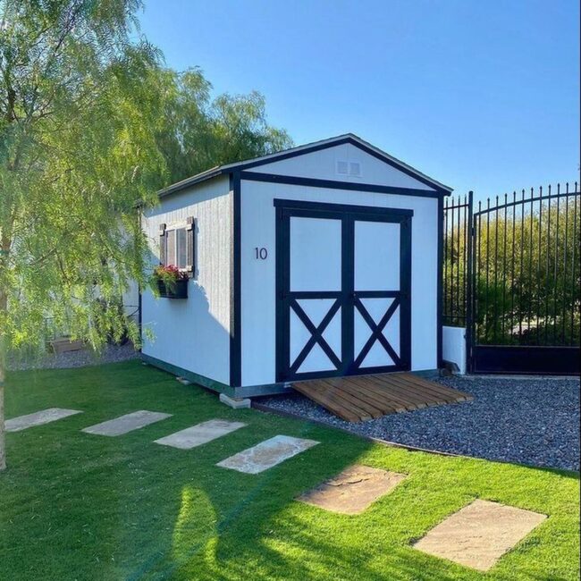 Chic Monochrome Shed with Rustic Touches