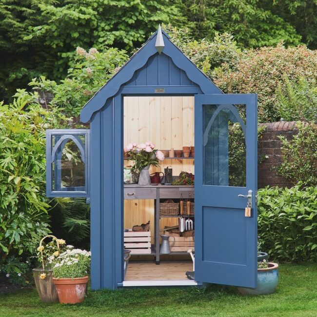 Charming Gothic Blue Shed with Entryway