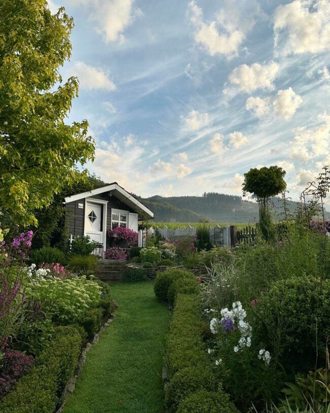 Charming Garden Shed with Scenic Walkway